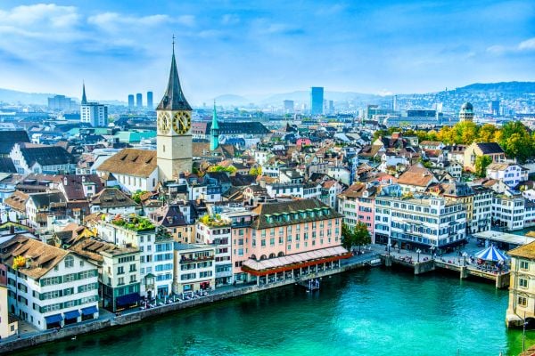 Houses and towers of Zurich in Switzerland viewed from the river