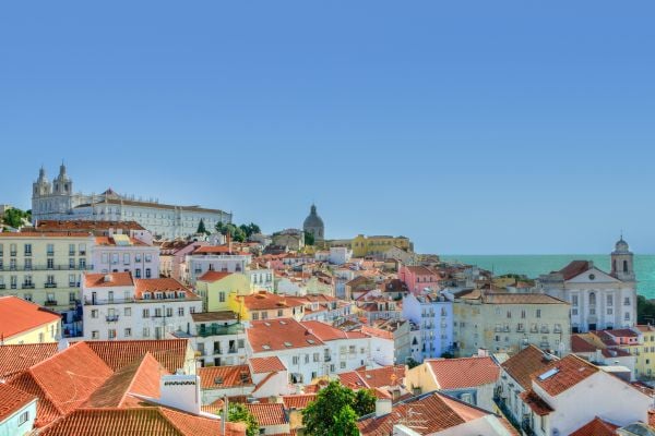Terracotta roofed houses overlooking the ocean in Portugal
